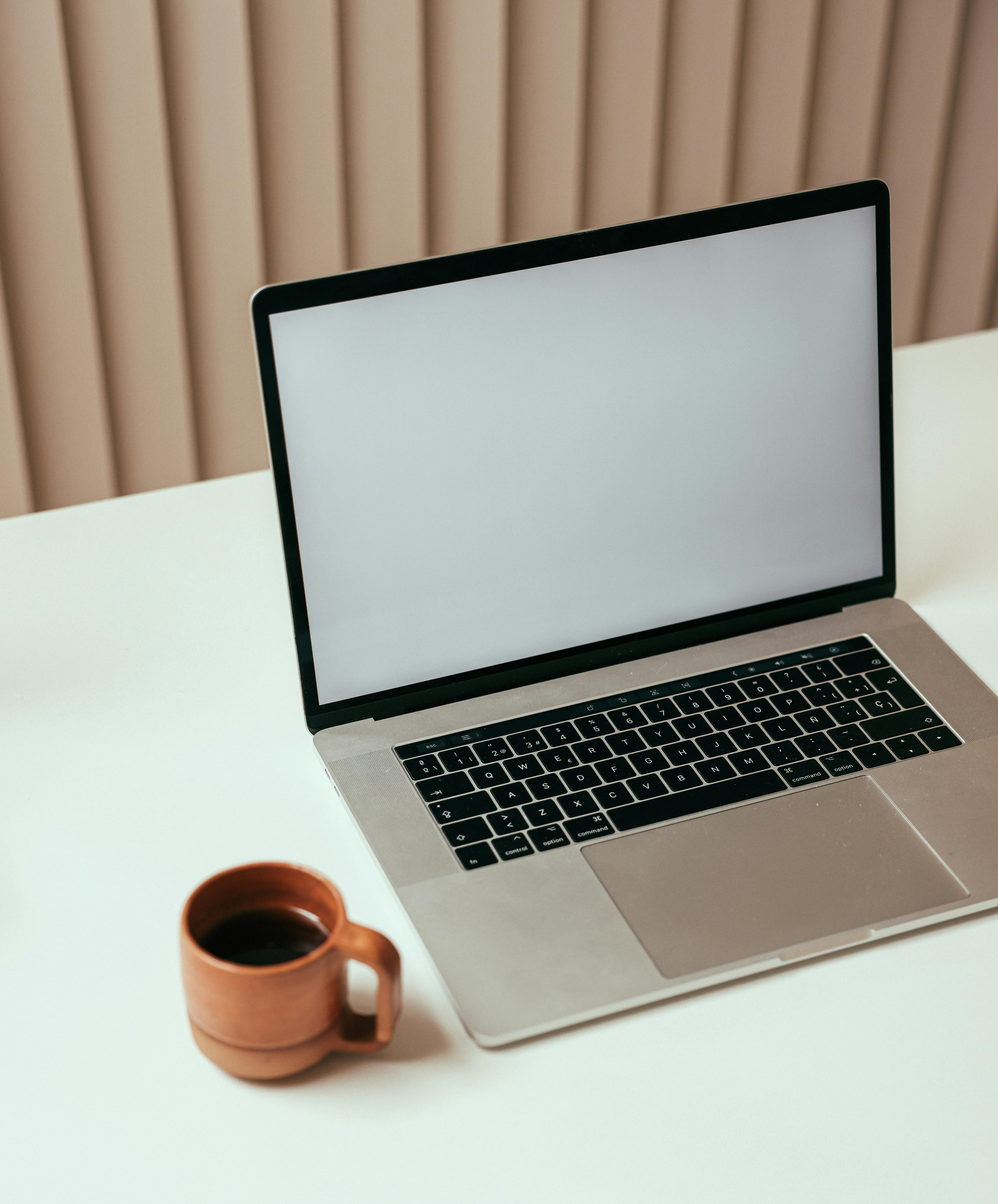 Workspace with laptop and coffee